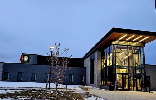 Front entry of Bozeman Fire station under an evening sky. 