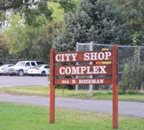 City Shop Complex Wooden Sign