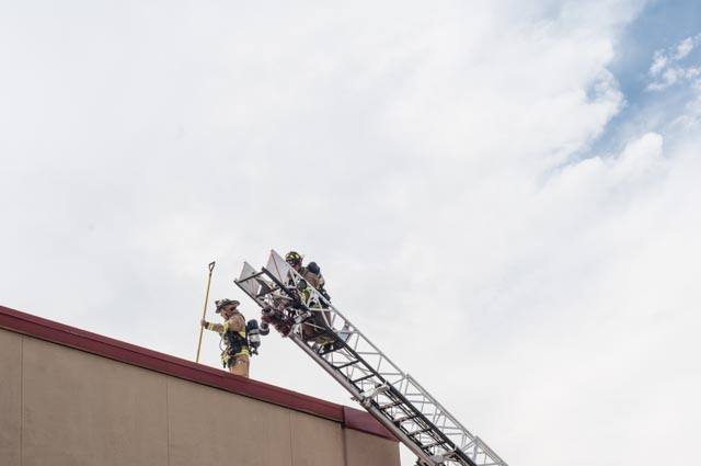 Firefighters on roof top